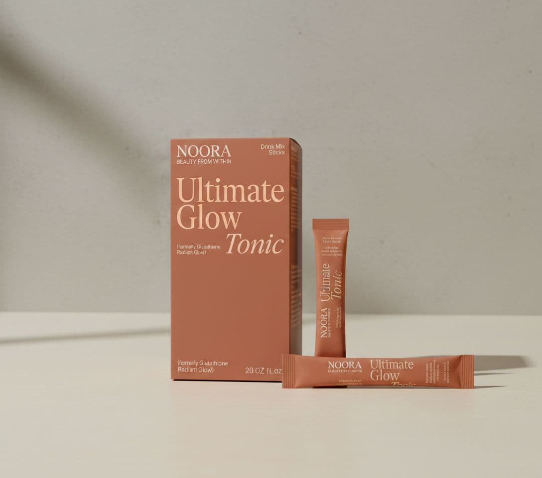 The Ultimate Glow Tonic carton and a single-serve sachet stick